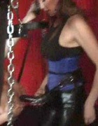 Masked gimp gets fucked by Jane on a swing chair
