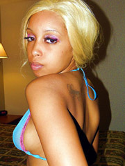 16 pics of a dark chocolate skin hottie recieving some cock like a profesional. she like it hard in the ass.