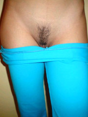 Cute pornstar luissa rosso shows off her sexy backside and spread her legs to dish out her hairy muff