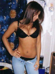 Sultry teen heats up the kitchen with her sizzling hot body