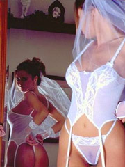 "carla and melissa help eachother out of there sexy lingerie."