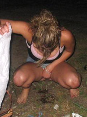 A horny teenage cutie caught peeing outside in a garden