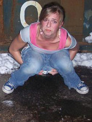 Bad redhead peeing and showing her pussy on green clearing