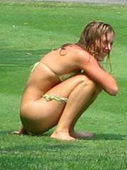 Teen girl peeing and rubbing her slit to pleasure herself