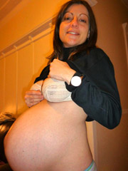 Pregnant babe gets her mouth fucked with a massive dick