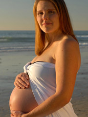 Expecting mommy brings herself to an orgasm