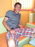 Handsome latin twink strips and poses outdoors