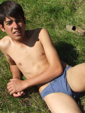 Stylish twink spreading his sexy buttocks and playing with his hard cock