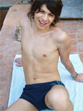 Guys swimming topless at the pool