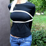 This slave is taken to a warehouse owned by her master and suspended from a forklift.