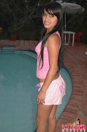 Mari bends over and shows her goods at the pool
