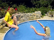Two teen cuties sharing a big cock in their swimmingpool