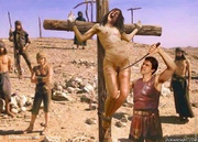 Roman slave crucified and has her pussy whipped!