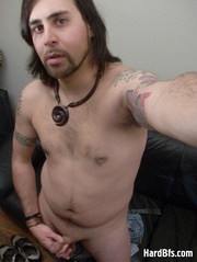Long haired gay stud making selfshot pics while undressing. Tags: Homosexual porn, naked men.