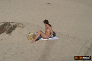 Naked amateur brunette spreading her legs wide while sunbathing. Tags: Reality, naked girl, voyeur.