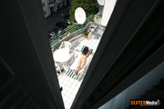 Dark haired sexy stunner sunbathing totally naked on the balcony. Tags: Voyeur, perfect butt, reality.