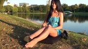 Dark haired amazing teen in blue short dress and high heels has an awesome legs to show.