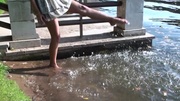 Perfect feet erotic teen beauty in short sexy drees teasingly playing in the water.