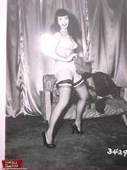 Vintage brunette in stockings.