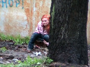 Hot girl with red hair filmed on the sly having a pee